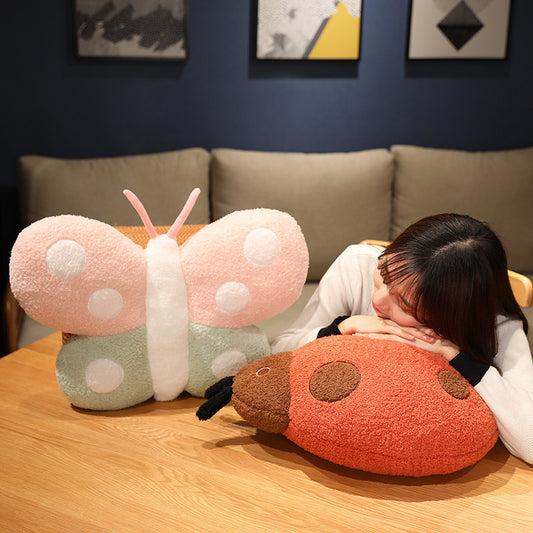 Butterfly and ladybug plush toys